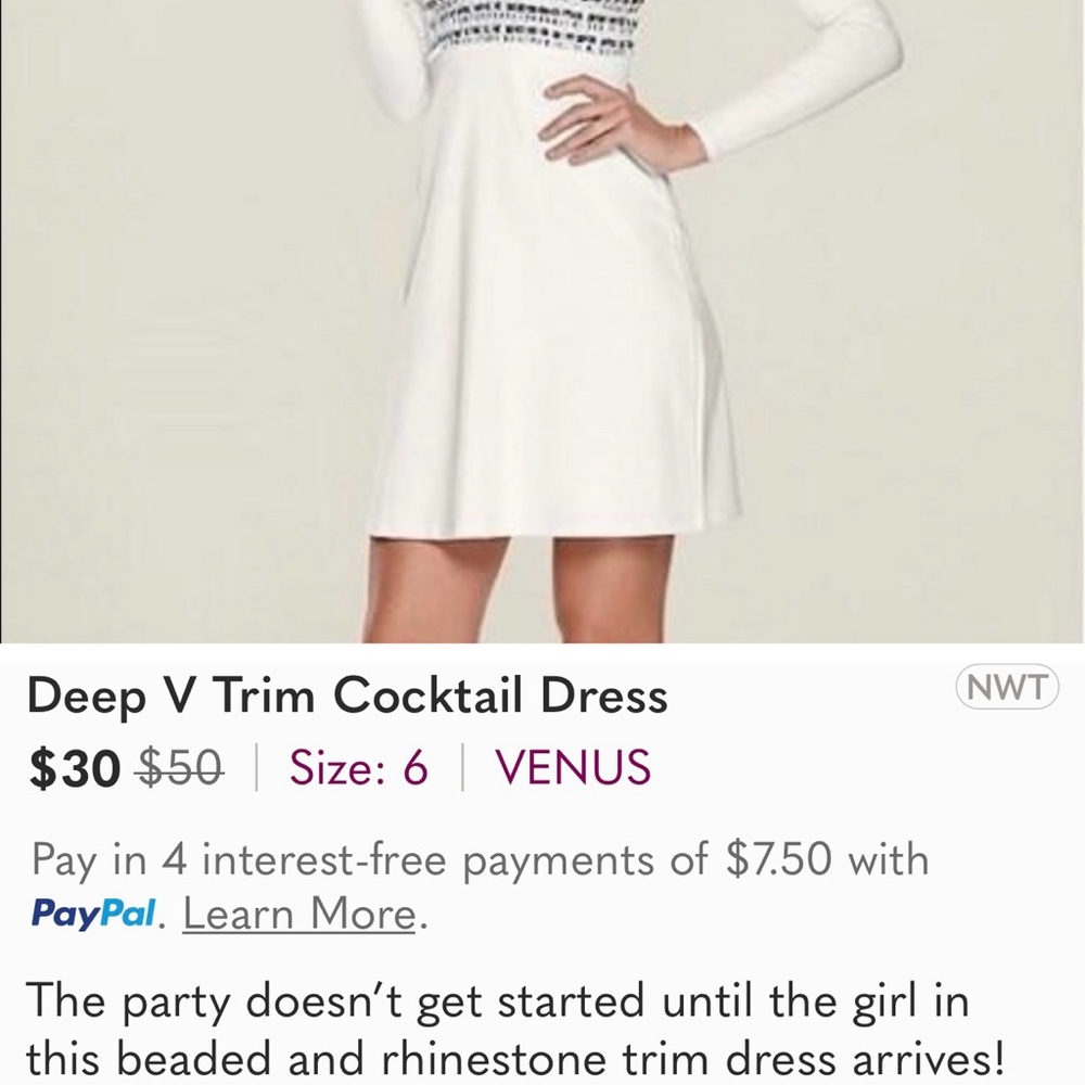 White vneck rhinestone dress.  Sure to turn heads.
